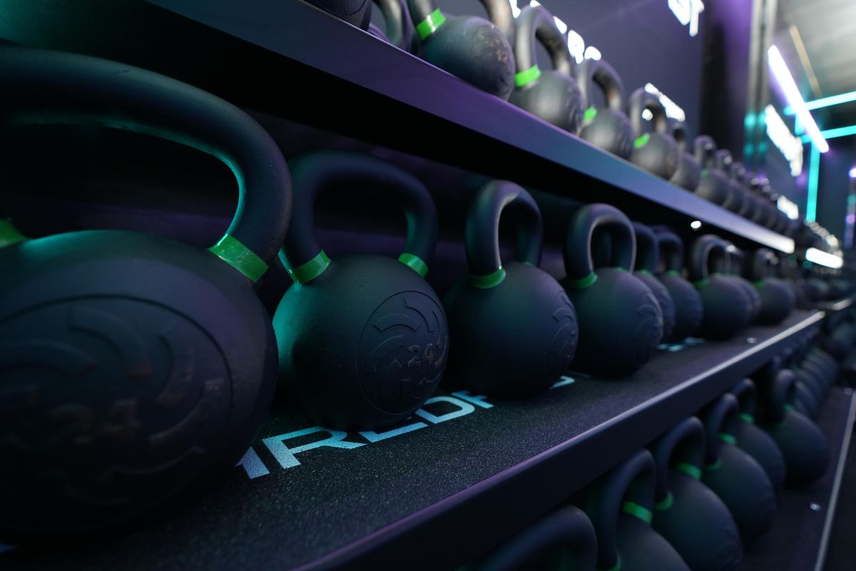 ShredFast kettlebells lined up on the rack