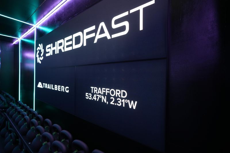 Illuminated wall sign reading ShredFast, Trafford, 53.47 degrees north, 2.31 degrees west